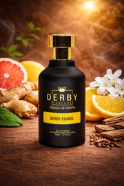 Black perfume bottle with gold cap on a wooden surface with fruits and spices