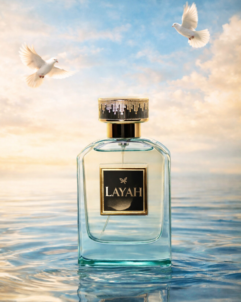 Layah perfume bottle with doves in the sky and water below