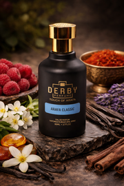 Black perfume bottle labeled 'Derby' on a rustic surface with flowers and spices.