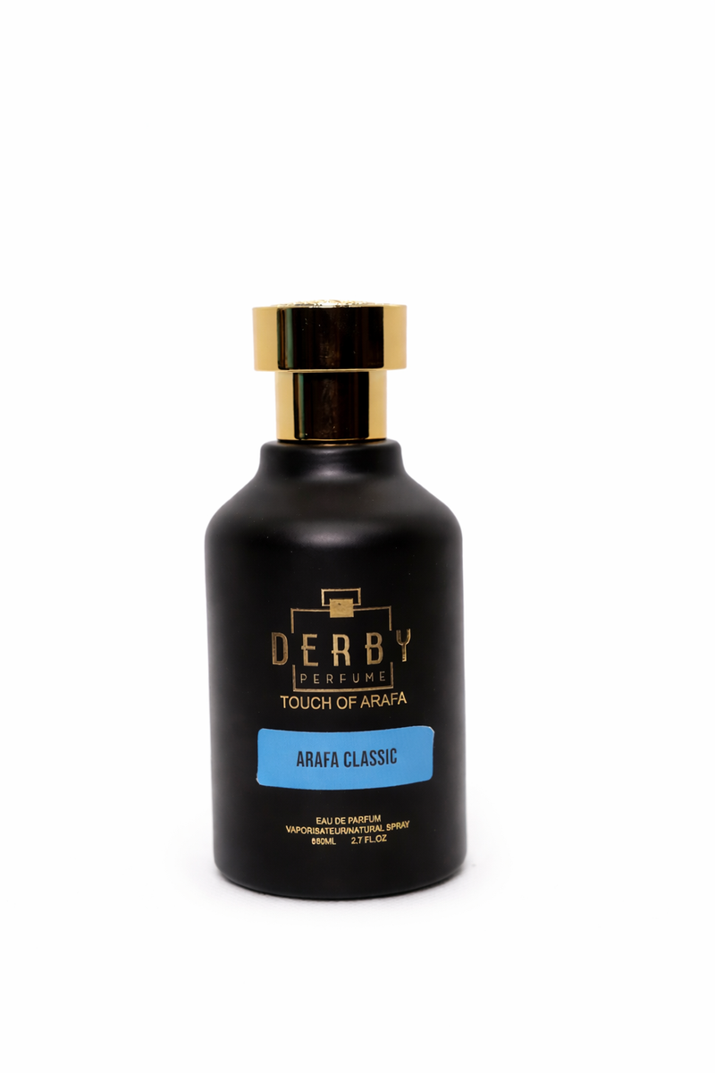 Black perfume bottle with gold cap labeled 'Derby' on a white background