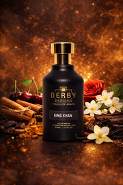 Derby Perfume bottle with spices and flowers on a warm brown background