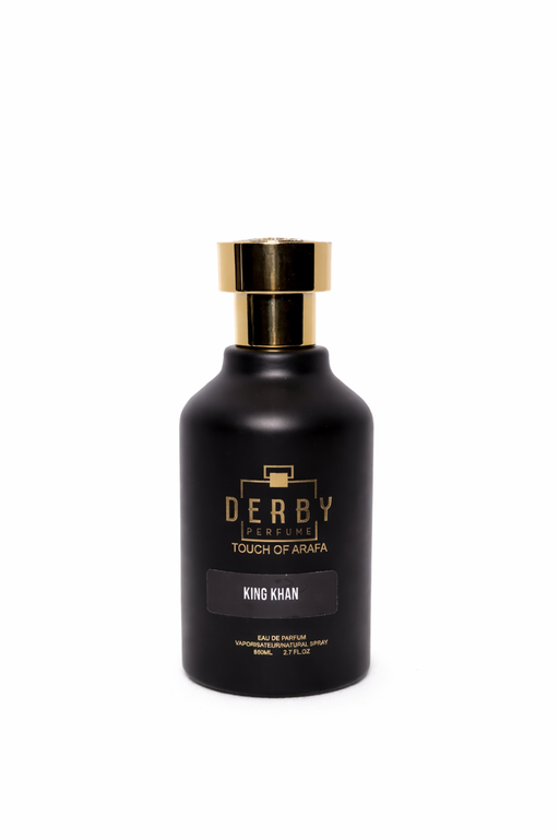 Black perfume bottle with gold cap on a white background