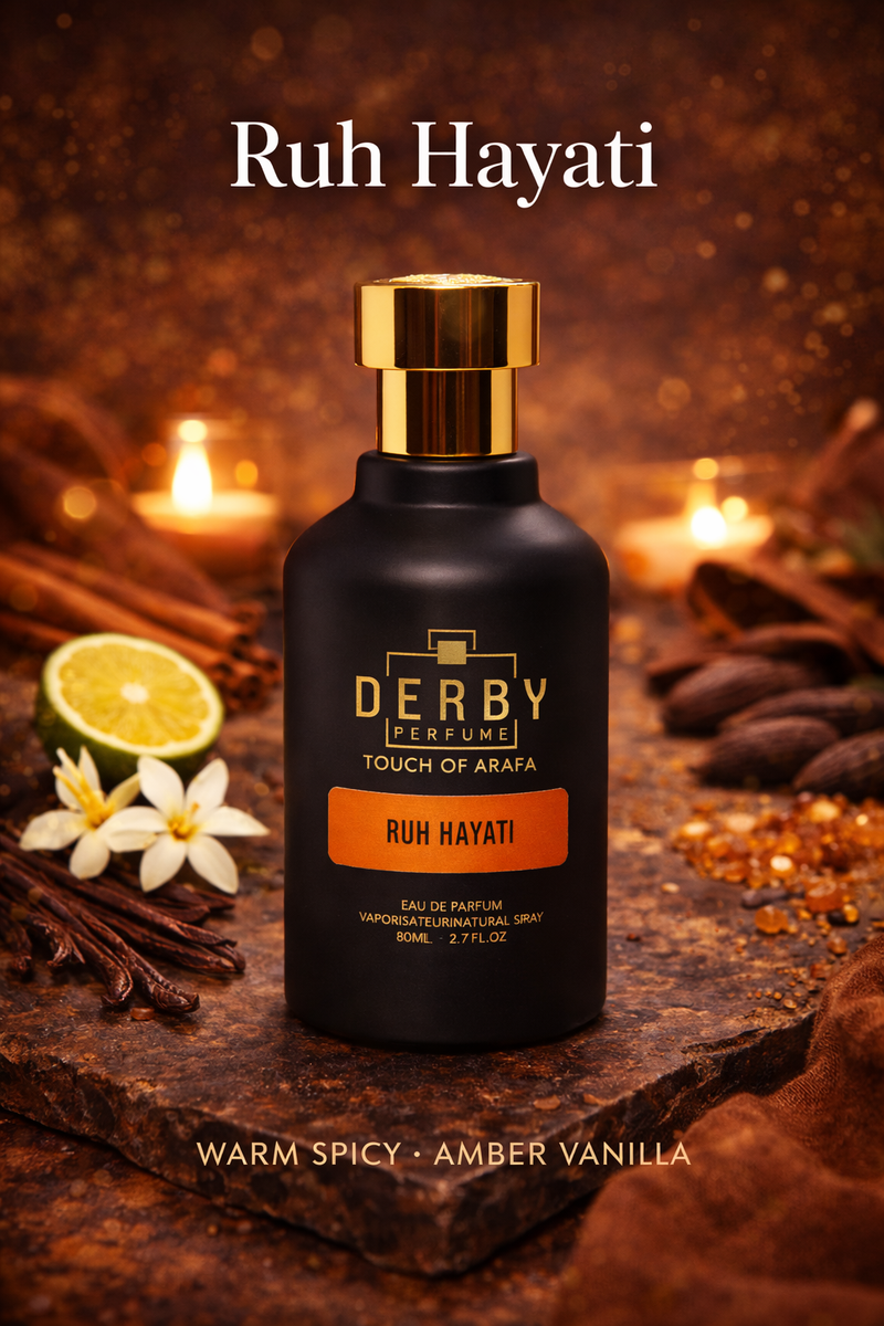 Derby Perfumes Ruh Hayati perfume bottle with spices and flowers on a dark background
